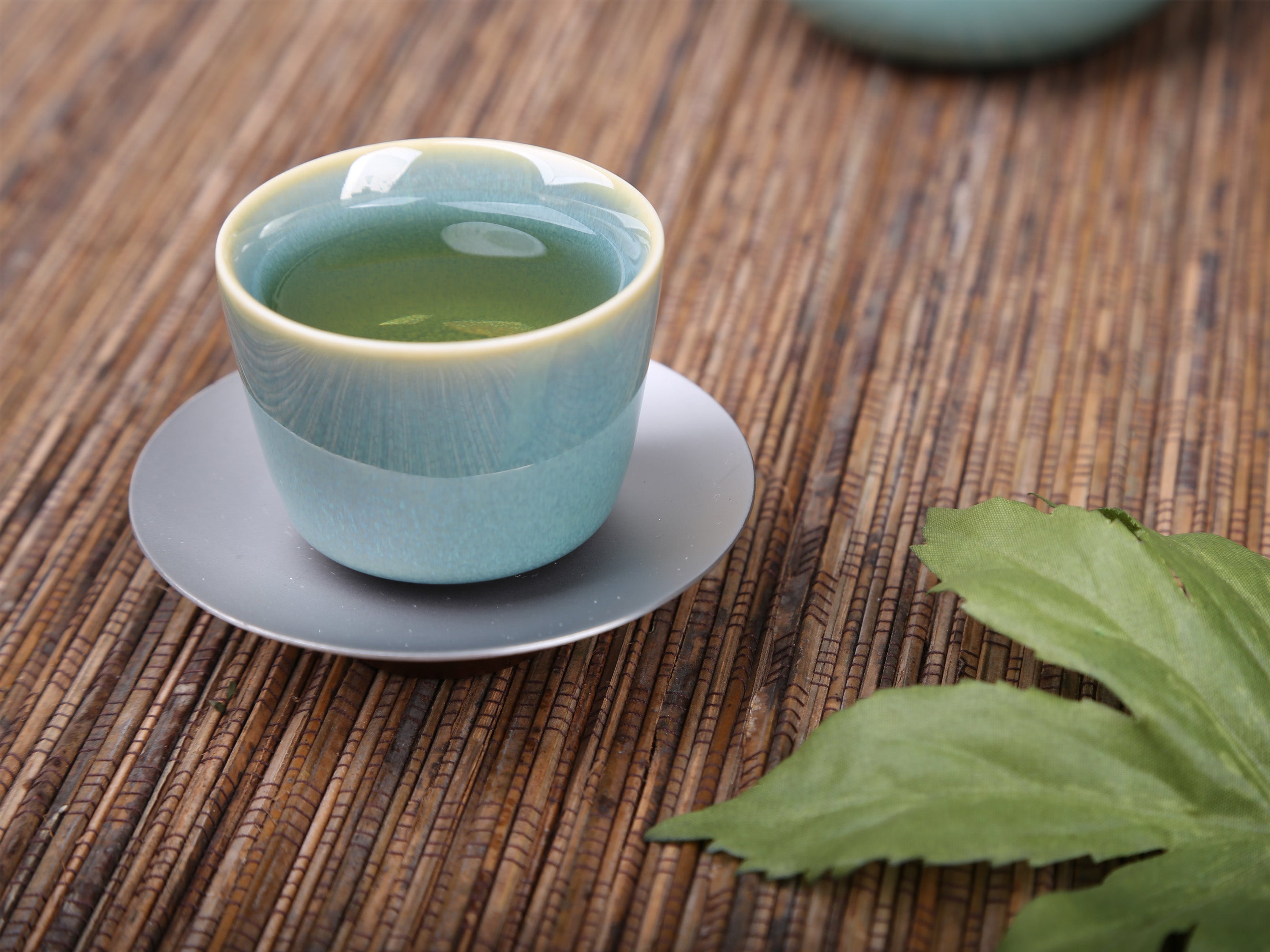 https://www.eilong.com/cdn/shop/products/Hare_sFurGlazeCupGreen-PorcelainChineseTeaCup01.jpg?v=1653623988
